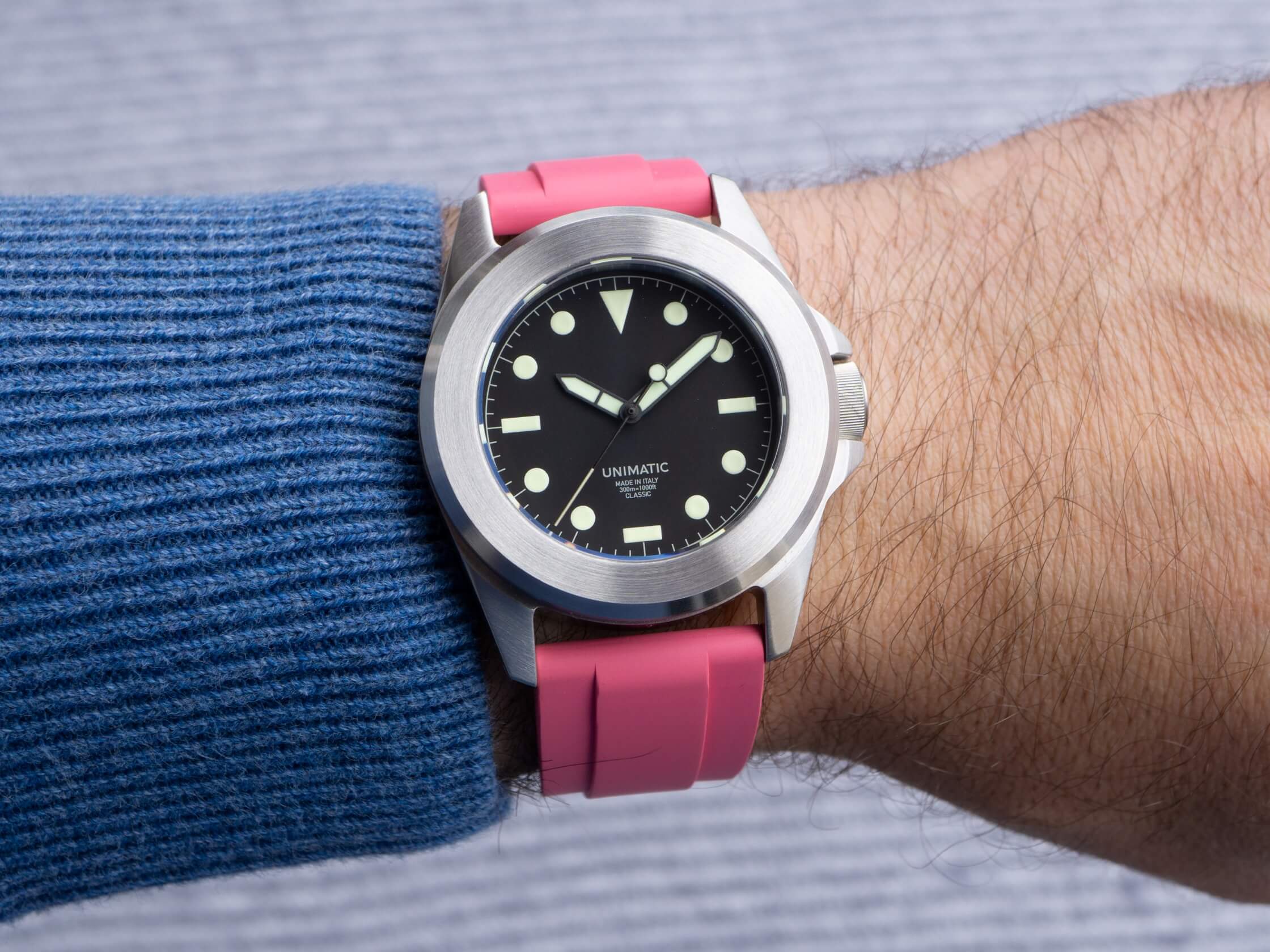 Pink FKM Rubber Strap by Brodinkee and StrapHabit on a Unimatic watch 