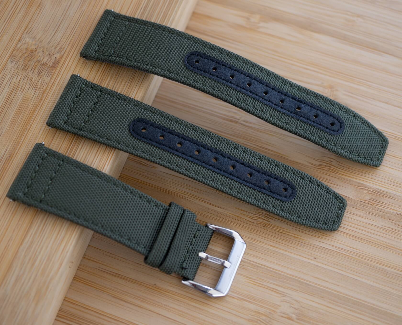 The sailcloth strap is delivered with both regular and long piece in the package