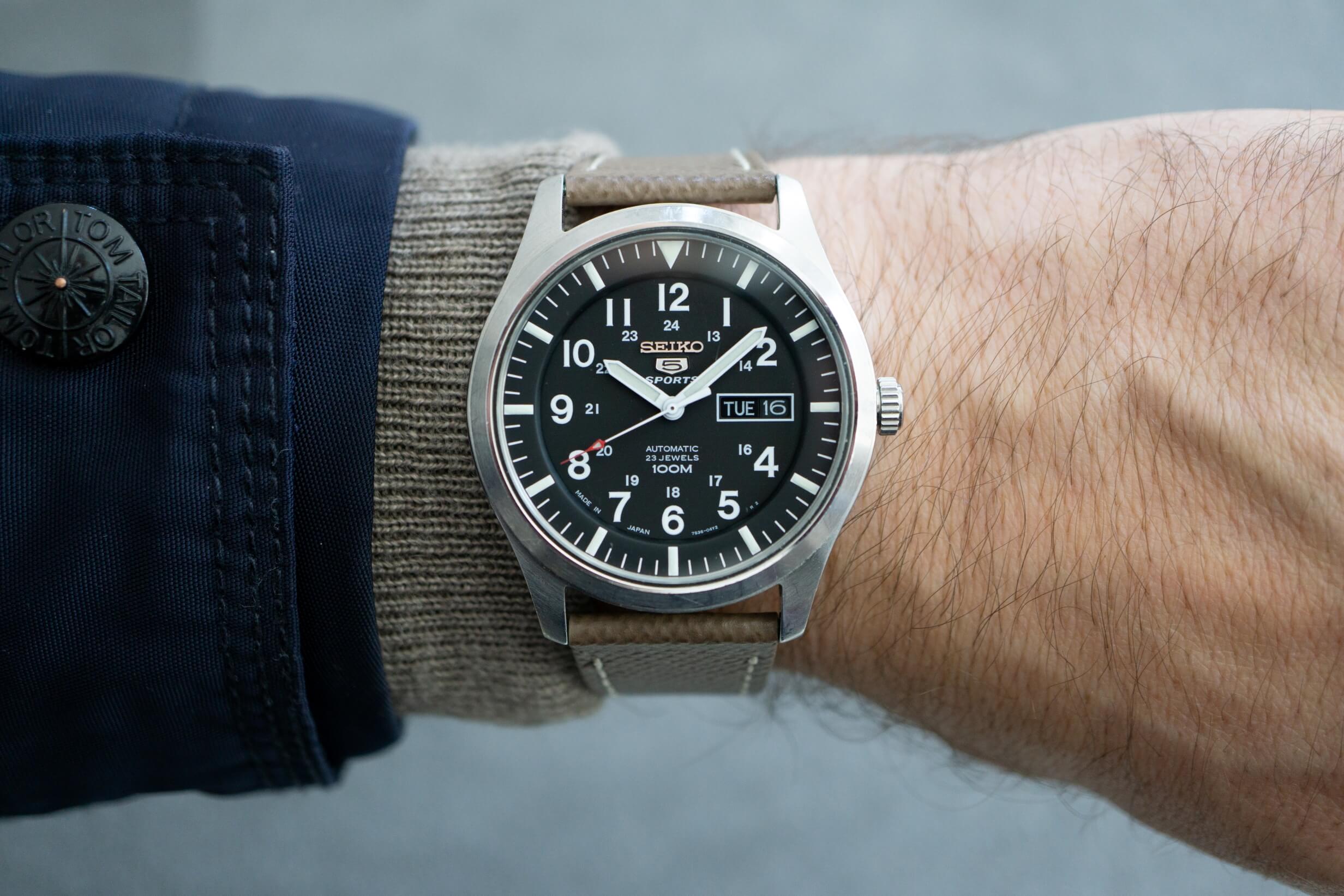 Seiko military watch paired with a leather strap